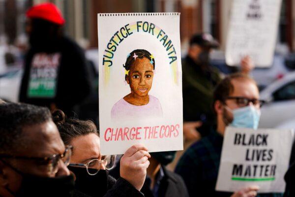 Protesters call for accountability in the death of 8-year-old Fanta Bility who was shot outside a football game, at the Delaware County Courthouse in Media, Pa., on Jan. 13, 2022. (Matt Rourke/AP Photo)