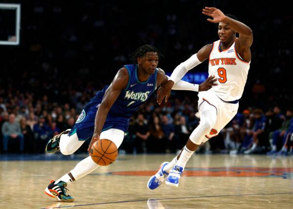 Anthony Edwards #1 of the Minnesota Timberwolves dribbles as RJ Barrett #9 of the New York Knicks defends during the first half at Madison Square Garden, in New York City, on Jan. 18, 2022. (Sarah Stier/Getty Images)