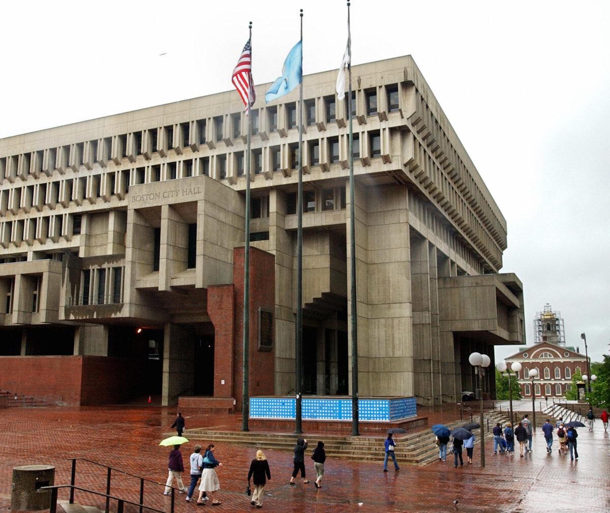 <br/>Boston City Hall and the historic Fanueil Hall (R) on May 16, 2004. (STAN HONDA/AFP via Getty Images)