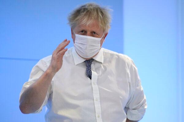 Prime Minister Boris Johnson visits the Rutherford Diagnostic Centre in Taunton, Somerset, England, on Jan. 20, 2022. (Andrew Matthews-WPA Pool/Getty Images)
