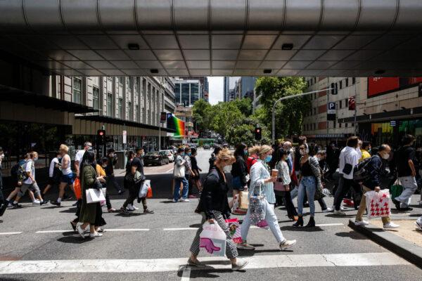 People walk along Lonsdale Street during the Boxing Day sales in Melbourne, Australia, on Dec. 26, 2021. (Diego Fedele/Getty Images)