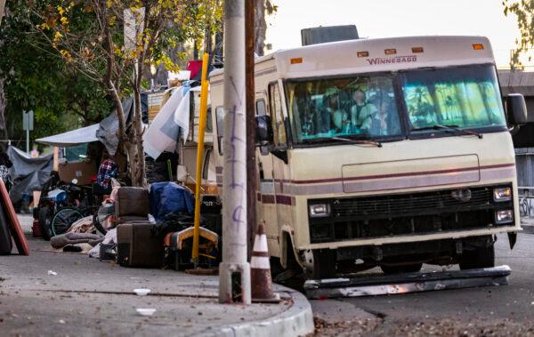 Homeless individuals live in RVs in Los Angeles, on Jan. 20, 2022. (John Fredricks/The Epoch Times)