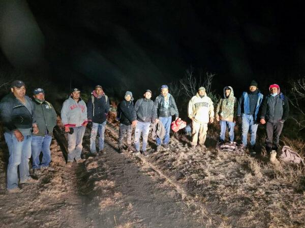 A group of illegal aliens is apprehended by law enforcement on a ranch in Kinney County, Texas, on Jan. 14, 2022. (Courtesy of Kinney County Sheriff's Office)