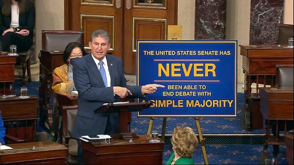 Sen. Joe Manchin (D-W.Va.) speaks on the floor of the U.S. Senate at the U.S. Capitol in Washington on Jan. 19, 2022. (Senate Television via AP)