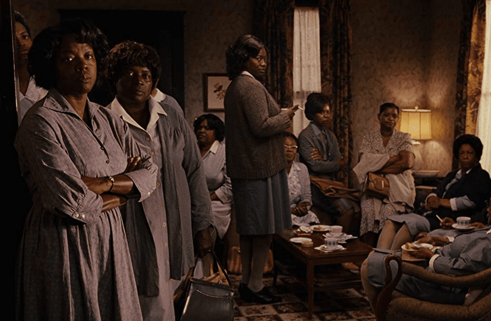 Aibileen Clark (Viola Davis, L) assembles a group of maids with stories to tell about their work life, in "The Help." (Walt Disney Studios Motion Pictures)