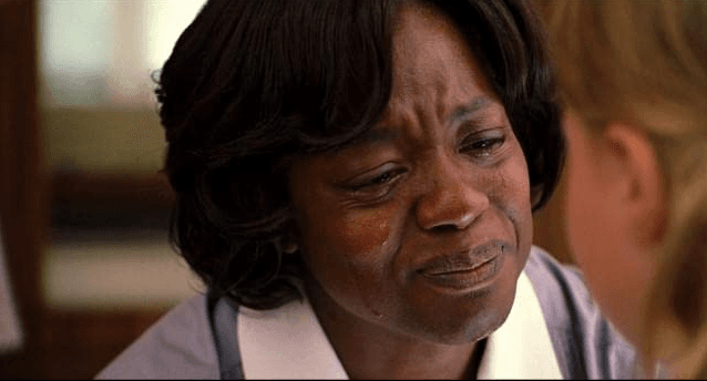 Aibileen Clark (Viola Davis) after being fired, saying goodbye to of one of the 17 white children she's helped raise over the years, in "The Help." (Walt Disney Studios Motion Pictures)