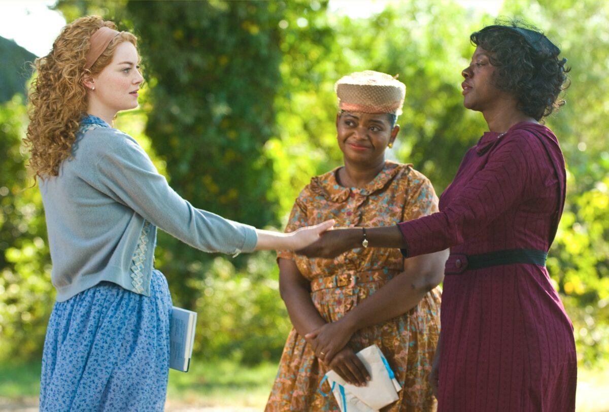 (L–R) Skeeter Phelan (Emma Stone), Minny Jackson (Octavia Spencer), and Aibileen Clark (Viola Davis). The two maids convince would-be writer Skeeter that she needs to have the courage to go on her hero's journey to New York and be a writer, in "The Help." (Walt Disney Studios Motion Pictures)
