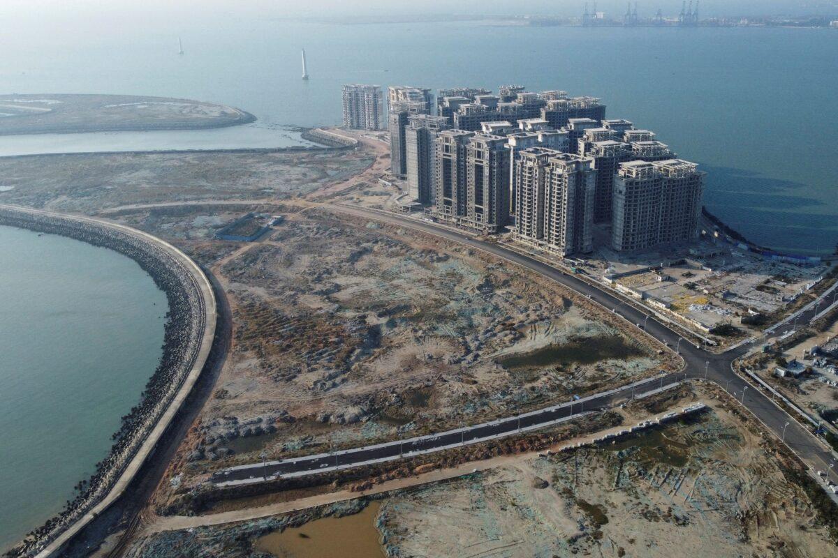  An aerial view shows the 39 buildings developed by China Evergrande Group, for which authorities issued a demolition order in Hainan Province, China, on Jan. 6, 2022. (Aly Song/Reuters)
