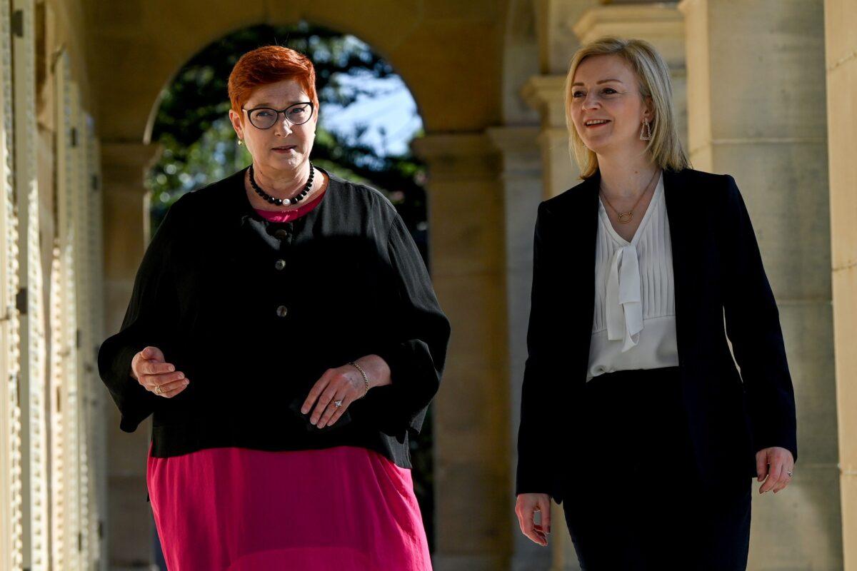 Australian Foreign Minister Marise Payne (L) and British Foreign Secretary Liz Truss arrive for Australia-UK Ministerial Consultations (AUKMIN) talks at Admiralty House in Sydney, on Jan. 21, 2022. (Bianca De Marchi-Pool/Getty Images)