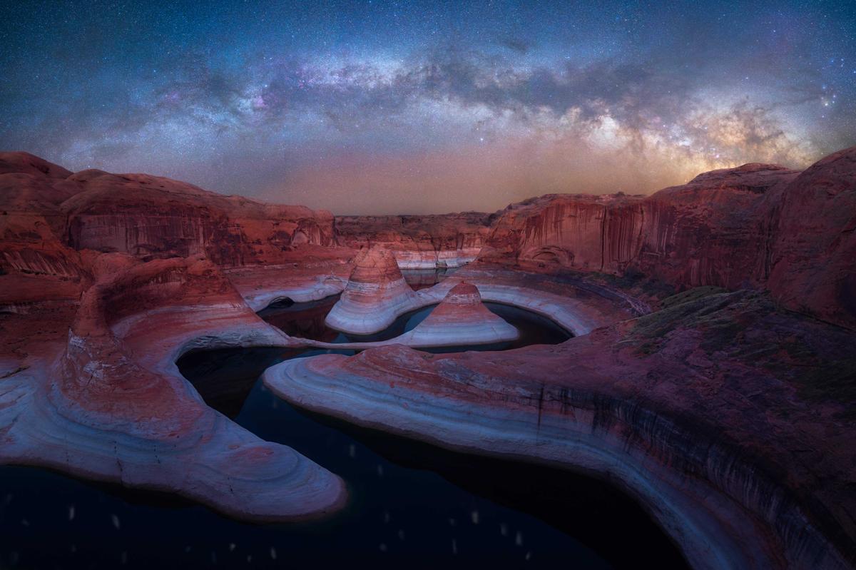  A late-night Milky Way arcing over a canyon in Utah. (Courtesy of <a href="https://marcinzajac.square.site/">Marcin Zając</a> and <a href="https://www.instagram.com/mrcnzajac/">@mrcnzajac</a>)