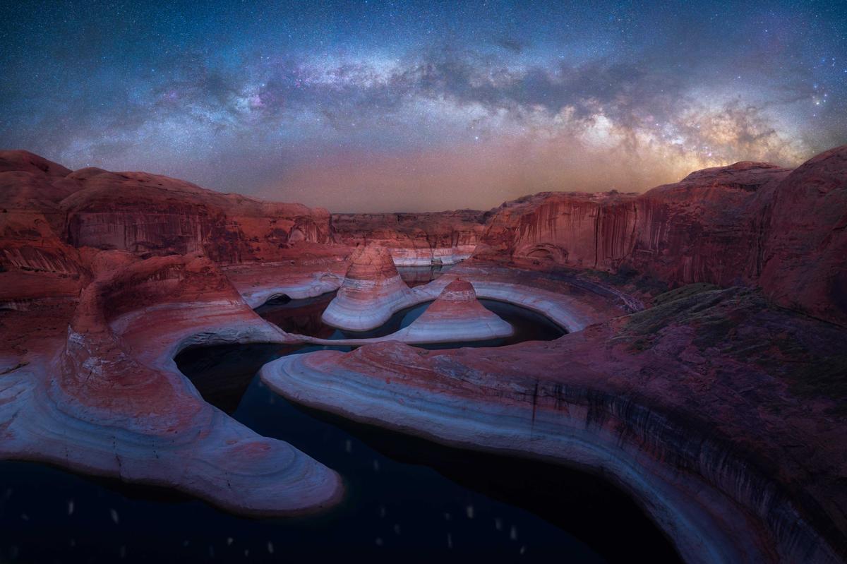 A late-night Milky Way arcing over a canyon in Utah. (Courtesy of <a href="https://marcinzajac.square.site/">Marcin Zając</a> and <a href="https://www.instagram.com/mrcnzajac/">@mrcnzajac</a>)