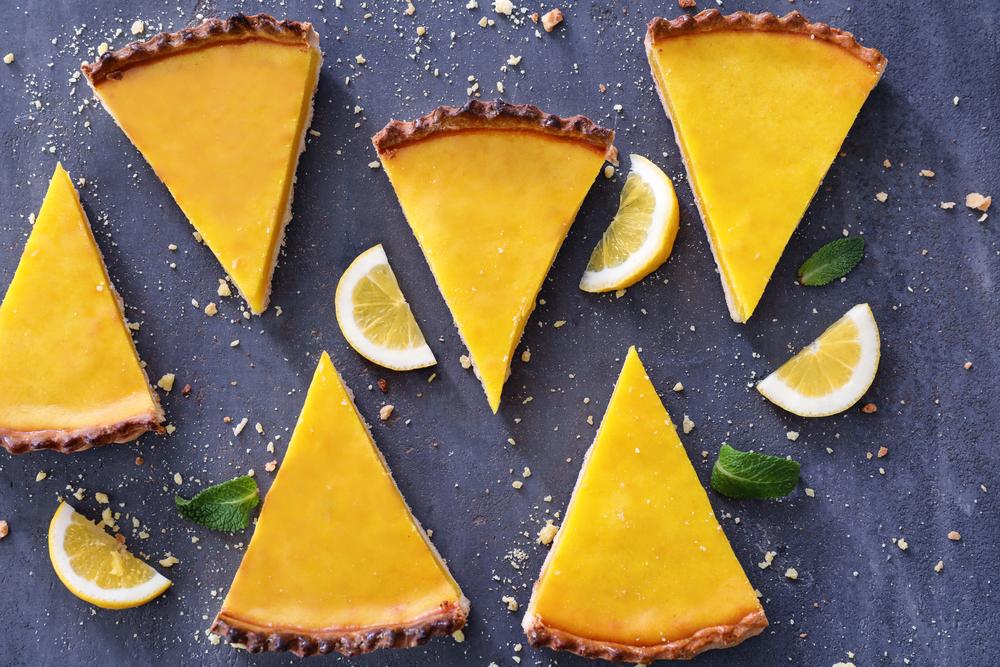 Each slice holds the perfect balance of creamy, sweet-tart filling and crisp, buttery crust. (Africa Studio/Shutterstock)