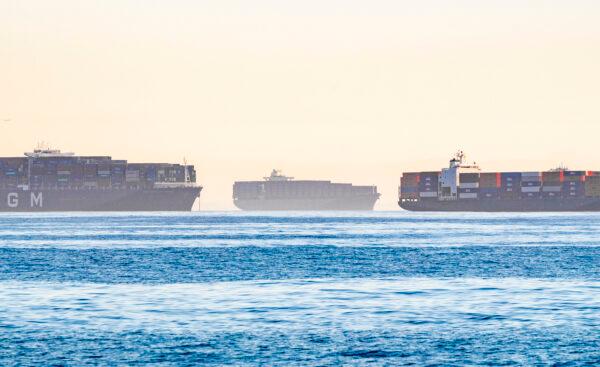  Cargo ships wait outside the ports of Los Angeles and Long Beach on Oct. 27, 2021. (John Fredricks/The Epoch Times)