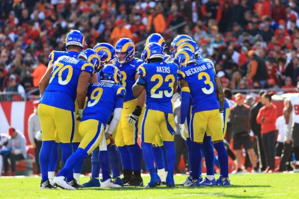 Los Angeles Rams offensive players huddle in the first quarter of the game against the Tampa Bay Buccaneers in the NFC Divisional Playoff game at Raymond James Stadium, in Tampa, on Jan. 23, 2022. (Mike Ehrmann/Getty Images)