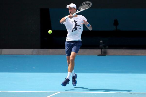 Novak Djokovic of Serbia practices on Rod Laver Arena ahead of the 2022 Australian Open at Melbourne Park in Melbourne, on Jan. 11, 2022. (Kelly Defina/Getty Images)