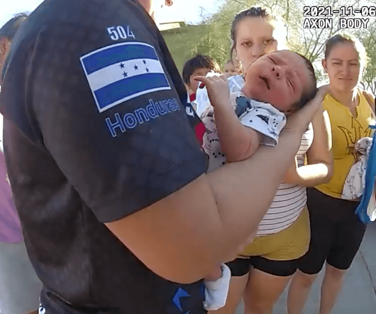 The then-3-day-old baby receives help. (Courtesy of <a href="https://www.phoenix.gov/police">Phoenix Police Department</a>)