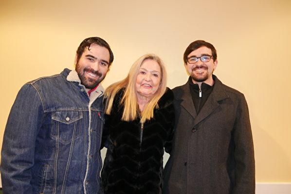 Margarita Marin-Dale, a retired professor of American University and a human rights lawyer, with her two sons after watching "Unsilenced" in Fairfax, Va., on Jan. 21, 2022. (Sherry Dong/The Epoch Times)