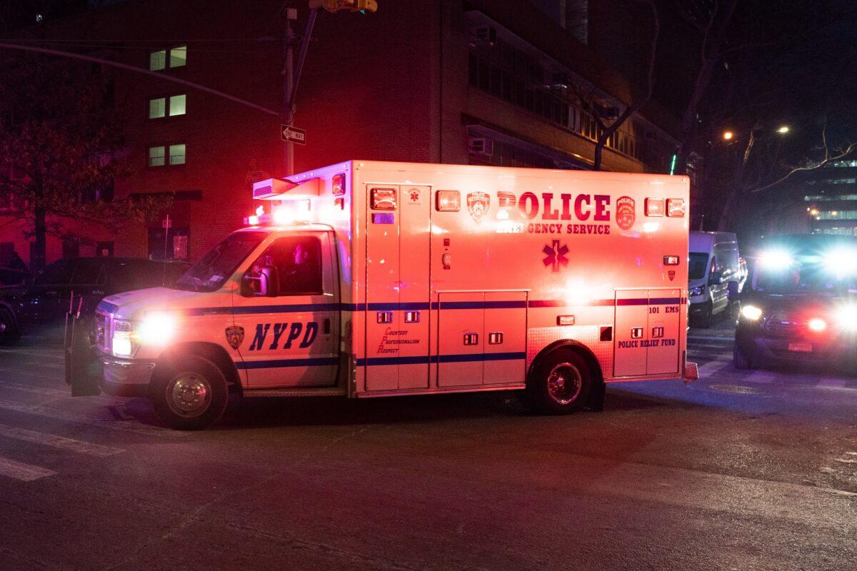 A New York police officer is taken by ambulance to a hospital in New York City on Jan. 23, 2022. (David Dee Delgado/Getty Images)