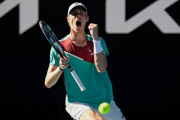 Denis Shapovalov of Canada celebrates after winning the fourth set against Rafael Nadal of Spain during their quarterfinal match at the Australian Open tennis championships in Melbourne, Australia, on Jan. 25, 2022. (Andy Brownbill/AP Photo)
