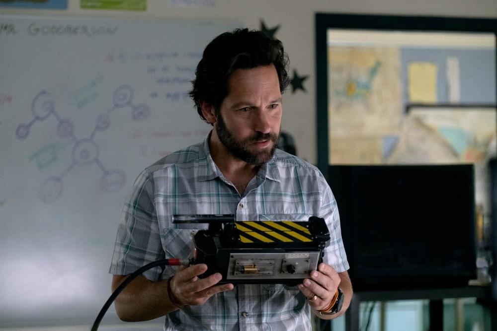 Lazy middle-school teacher Gary Grooberson (Paul Rudd) tries to figure out a strange contraption, in "Ghostbusters: Afterlife." (Columbia Pictures)