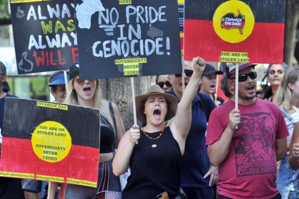 Protesters shout slogans as they march in an “Invasion Day” rally in Sydney, Australia, on Jan. 26, 2019. (Farooq Khan/AFP via Getty Images)