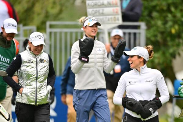 (L-R) Gaby Lopez of Mexico, Nelly Korda of the United States, and Annika Sörenstam of Sweden walk down the first fairway during the final round of the 2022 Hilton Grand Vacations Tournament of Champions at Lake Nona Golf & Country Club, in Orlando, on Jan. 23, 2022. (Julio Aguilar/Getty Images)