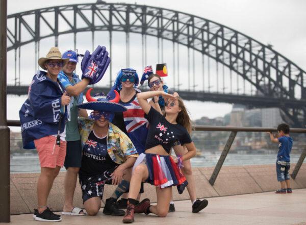 Australia Day revellers pose for photos at Circular Quay in Sydney, Australia, on Jan. 26, 2018. (Cole Bennetts/Getty Images)