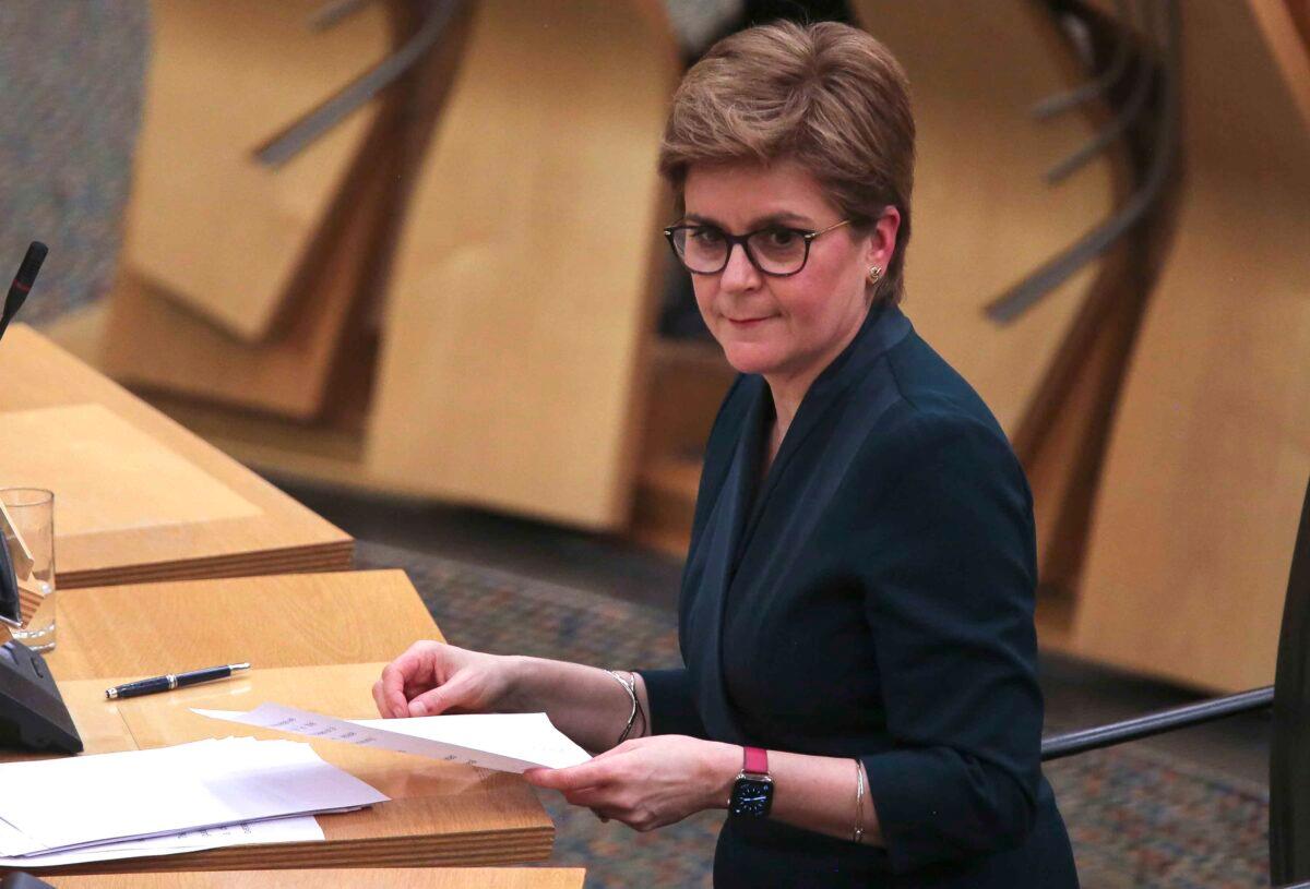 Scottish First Minister Nicola Sturgeon addresses the Scottish Parliament on changes to COVID-19 restrictions, in Edinburgh on Jan. 25, 2022. (Fraser Bremner - Pool/Getty Images)