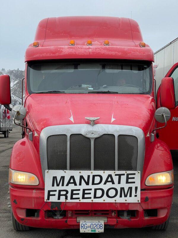 A sign on the front of one of the trucks participating in Freedom Convoy 2022, in Winnipeg, Manitoba, on Jan. 25, 2022. (Melissa Perepelkin)