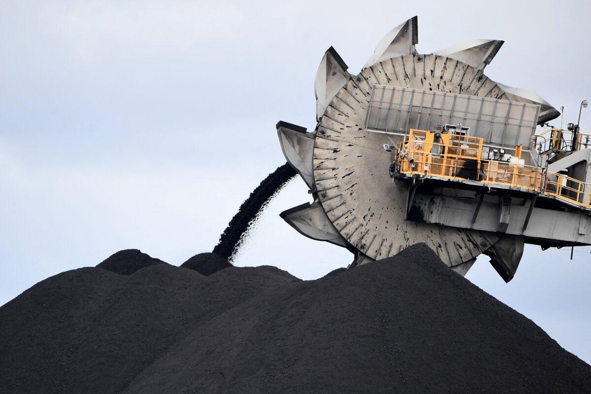 A bucket-wheel for dumping soil and sand was removed from another area of a mine in Newcastle, Australia, the world's largest coal exporting port, on Nov. 5, 2021. (Seed Khan/AFP via Getty Images)