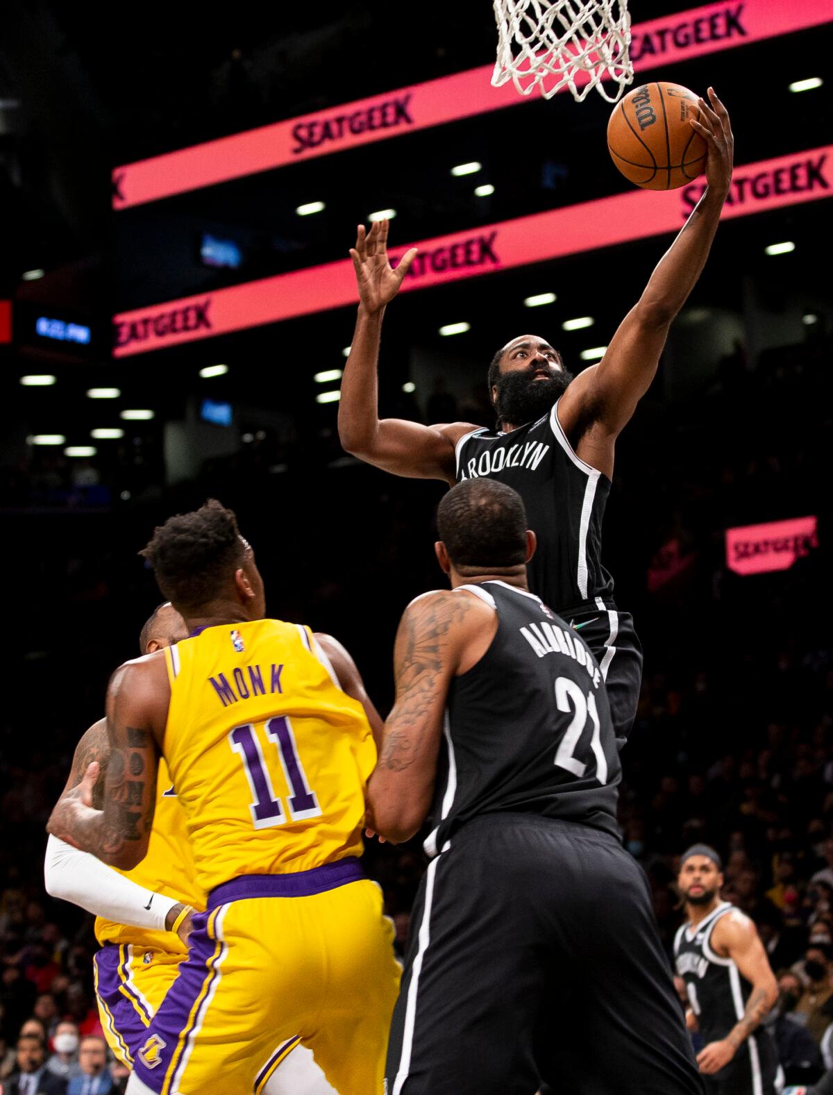 James Harden #13 of the Brooklyn Nets scores on a layup against the Los Angeles Lakers at Barclays Center, in New York City, on Jan. 25, 2022. (Michelle Farsi/Getty Images)