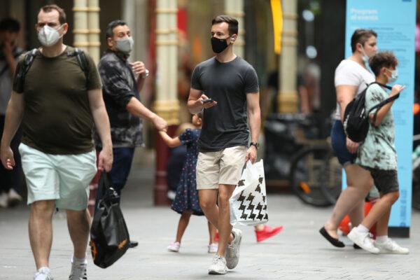 A shopper walks in Sydney's CBD, Australia, on Dec. 24, 2021. (Jason McCawley/Getty Images)