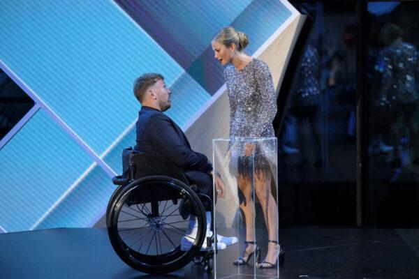 Australian of the year Dylan Alcott greets Grace Tame at the 2022 Australian of the Year Awards at the National Arboretum on January 25, 2022, in Canberra, Australia. (Photo by Brook Mitchell/Getty Images)
