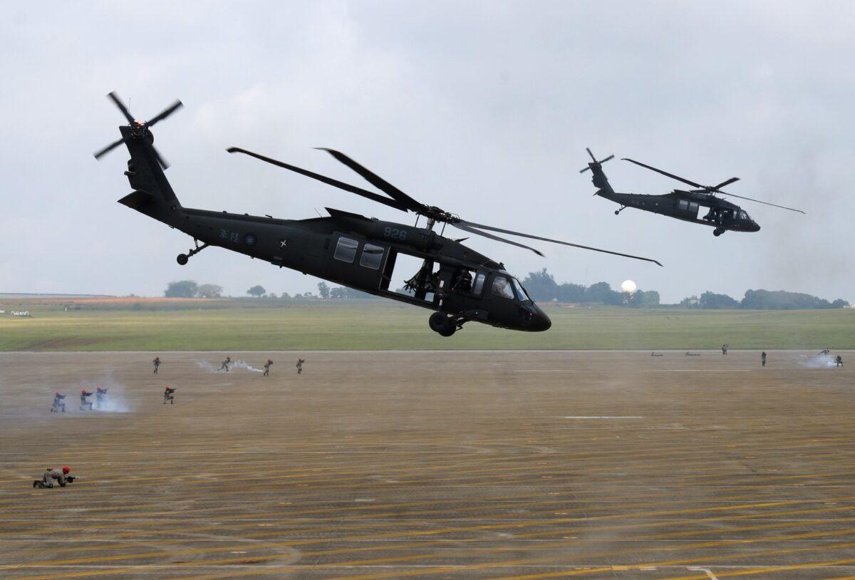 A pair of UH-60 Black Hawk helicopters take part in the Han Kuang drill at the Ching Chuan Kang (CCK) air force base in Taichung, central Taiwan, on June 7, 2018. (Sam Yeh/AFP via Getty Images)