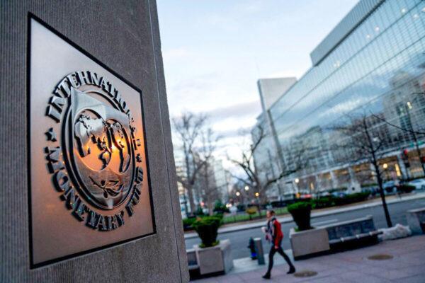 The seal for the International Monetary Fund is seen near the World Bank headquarters (R) in Washington, on Jan. 10, 2022. (Stefani Reynolds/AFP via Getty Images)