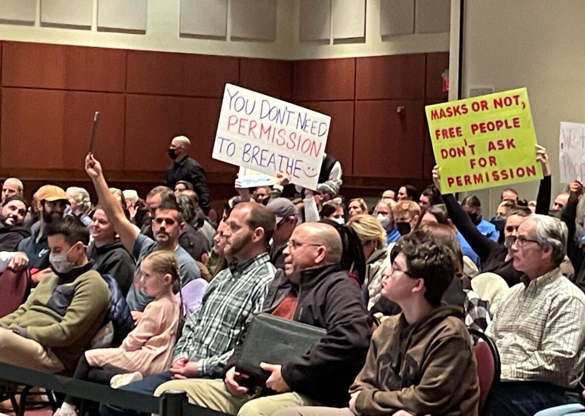 Attendees at the Loudoun County school board meeting in Ashburn, Va., on Jan. 25, 2022. (Terri Wu/The Epoch Times)