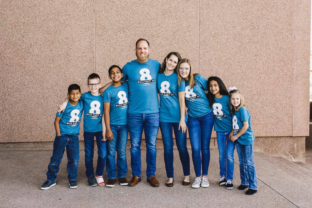 (L–R): Cristian, Joshua, Xavier, Jake, Erin, Kennedi, Marie, and Hannah Mills. (Courtesy of Micah Schmidt/Double Knot Photography via Jake Mills)