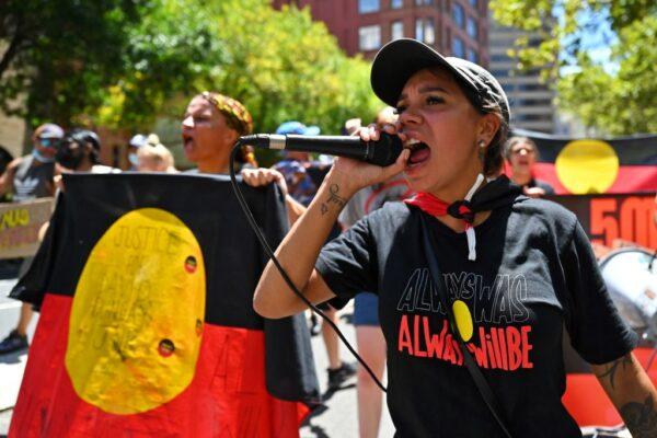 Protesters take part in an "Invasion Day" demonstration on Australia Day in Sydney on Jan. 26, 2022. (Steven Saphore/AFP via Getty Images)