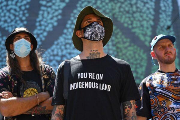 Protesters take part in an "Invasion Day" demonstration on Australia Day in Sydney on January 26, 2022. (Steven Saphore/AFP)