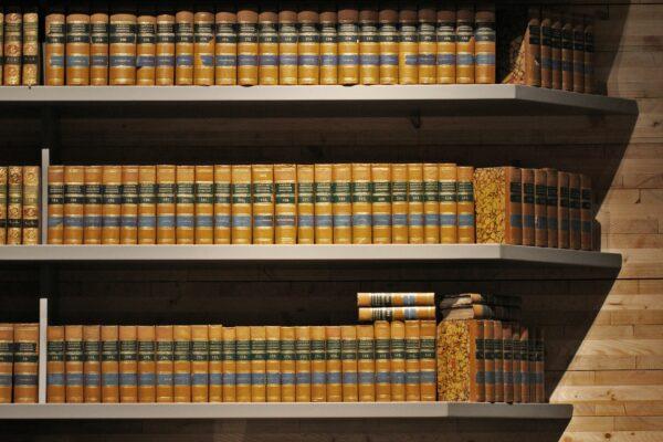 A stock photo of hardbound books in order. (Jonah Pettrich/Unsplash)