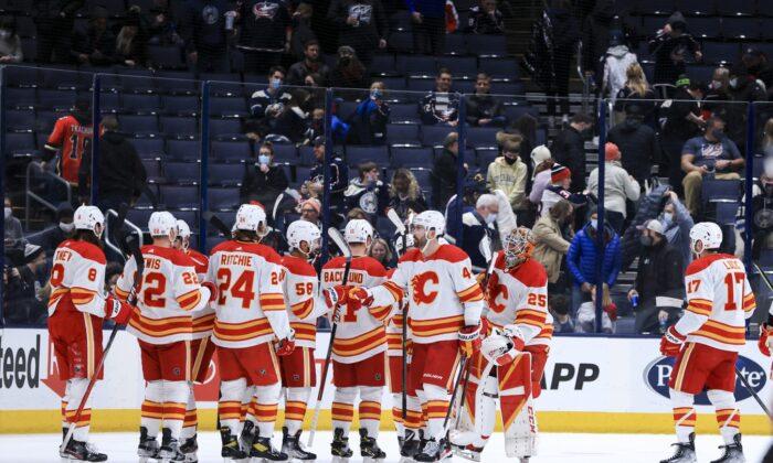 NHL Roundup: Flames Set Shot Record in Rout of Jackets