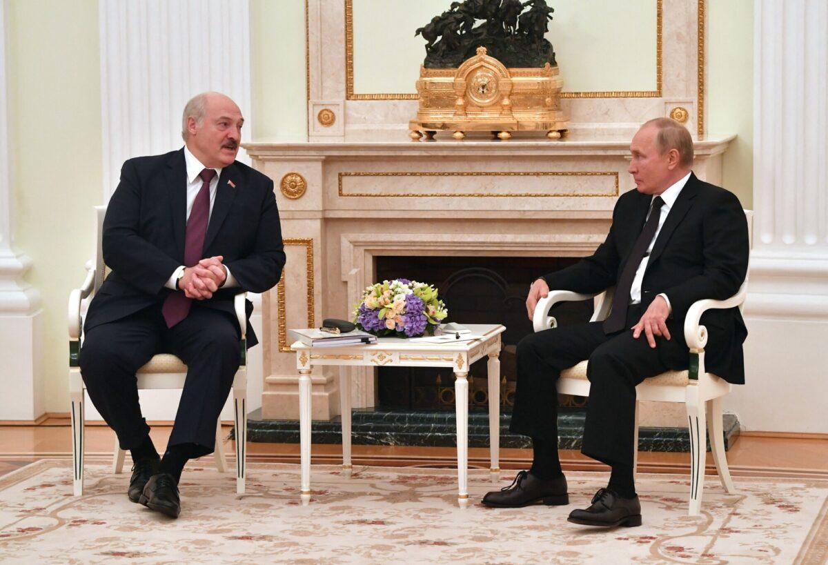 Russian President Vladimir Putin (R) meets with Belarusian President Alexander Lukashenko at the Kremlin in Moscow on Sept. 9, 2021. (Mikhail Voskresenskiy/Sputnik/AFP via Getty Images)