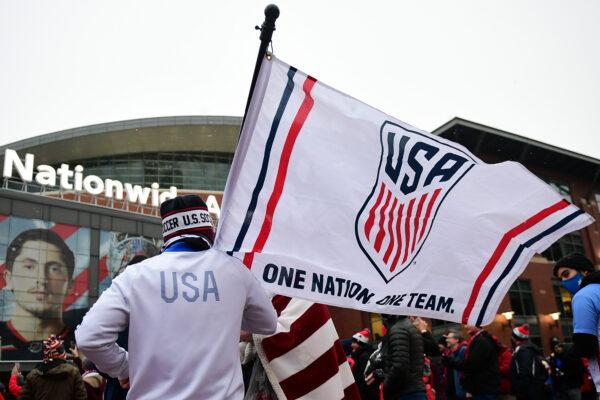 USMNT fans march to Lower.com Field for the 2022 World Cup Qualifying game between El Salvador and the United States in Columbus, Ohio, on Jan. 27, 2022. (Emilee Chinn/Getty Images)