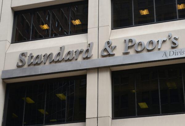 A sign for Standard & Poor's rating agency stands in front of the company headquarters in New York, on Sep. 18, 2012. (Emmanuel Dunand/AFP via Getty Images)