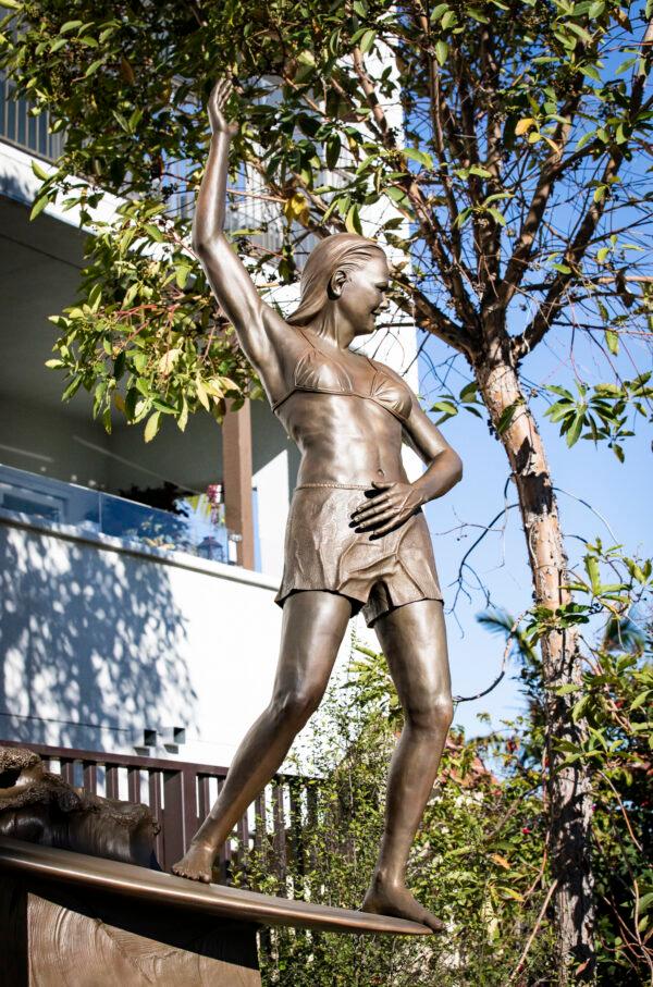 The unveiling of a statue depicting surfing icon Joyce Hoffman is held at Watermen's Plaza in Dana Point, Calif., on Jan. 27, 2022. (John Fredricks/The Epoch Times)