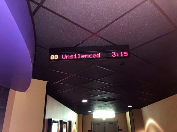 An overhead sign indicates that “Unsilenced” is showing at Century Theater in San Jose, Calif., on Jan. 26, 2022. (Cynthia Cai/The Epoch Times)