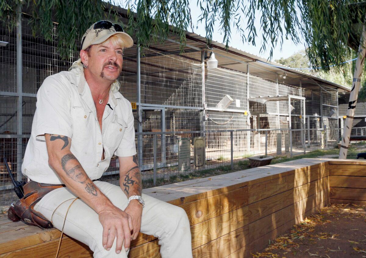 Joseph Maldonado known also as “Tiger King” Joe Exotic answers a question during an interview at the zoo he runs in Wynnewood, Okla., on Aug. 28, 2013. (Sue Ogrocki/AP Photo)