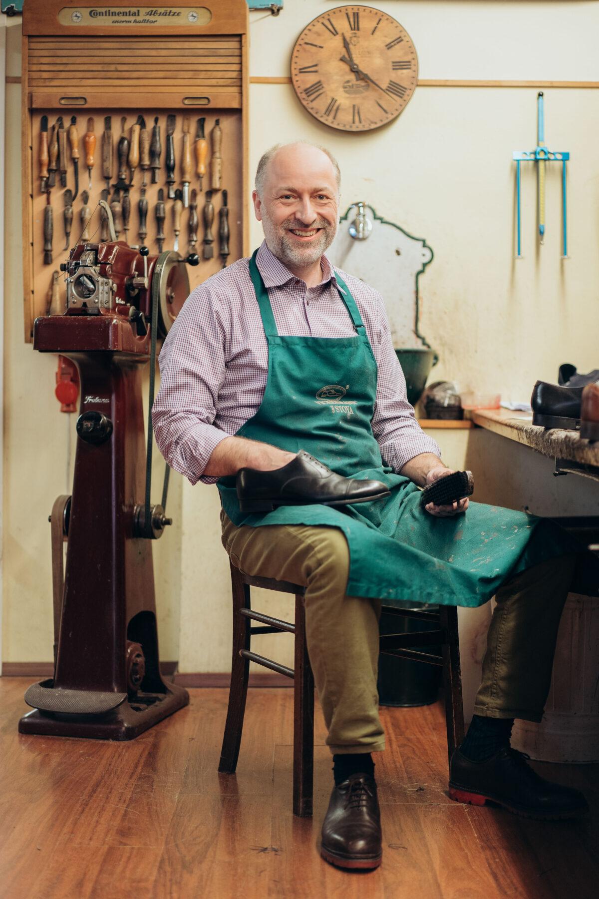 Martin Stoya, a trained orthopedic shoemaker, can always be found with an apron on in the Vickermann and Stoya shop, repairing a pair of shoes or handmaking a new one.<br/>(Courtesy of Vickermann und Stoya)