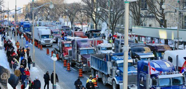 Trucks parked on a street by the Parliament Hill in Ottawa on Jan. 29, 2022. (Jonathan Ren/The Epoch Times)