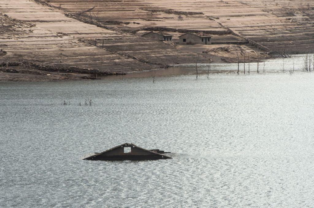 Usually submerged ruins of the former village of Aceredo appear from the Lindoso Reservoir due to low water levels. (Miguel Riopa/AFP via Getty Images)